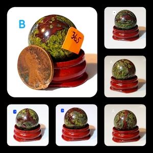 2 Awesome Natural Dragon's Blood Spheres With Glossy Red-Brown Wooden Base.